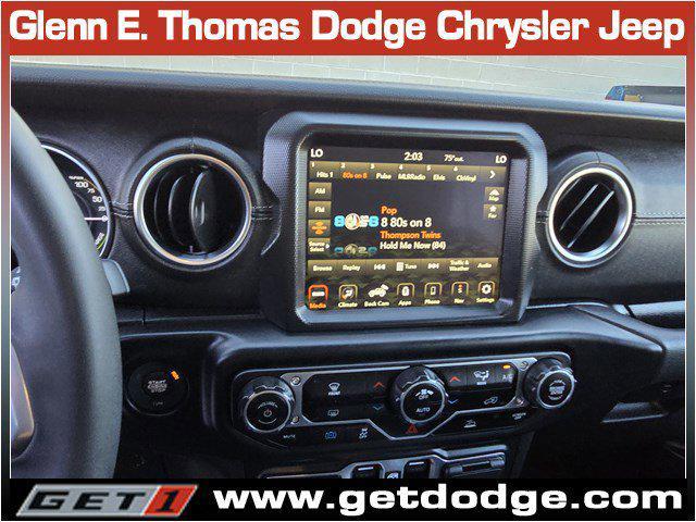 used 2023 Jeep Wrangler 4xe car, priced at $34,989