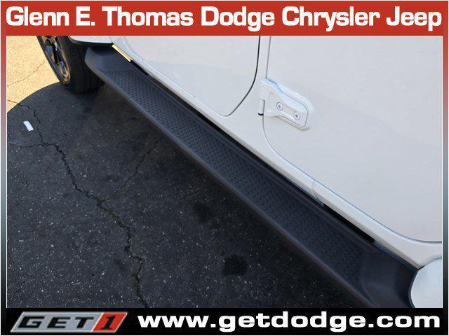 used 2023 Jeep Wrangler 4xe car, priced at $34,989