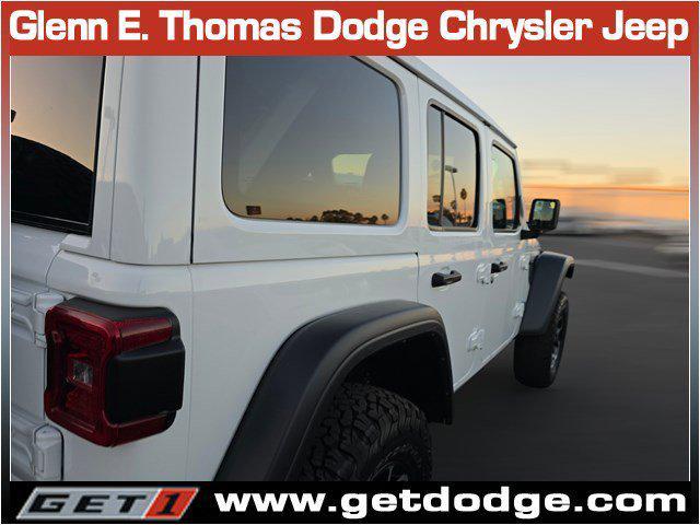 used 2021 Jeep Wrangler Unlimited car, priced at $36,910