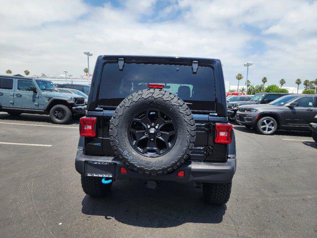 used 2023 Jeep Wrangler 4xe car, priced at $72,457