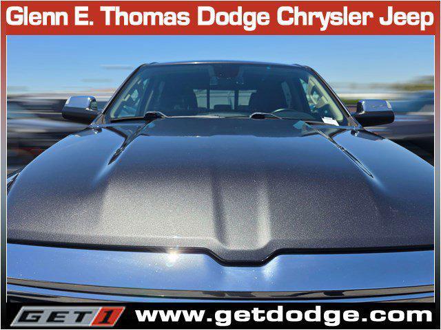 used 2019 Ram 1500 car, priced at $35,264