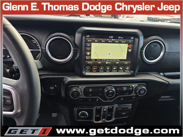 used 2023 Jeep Wrangler 4xe car, priced at $31,899