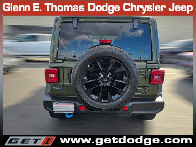 used 2023 Jeep Wrangler 4xe car, priced at $31,899