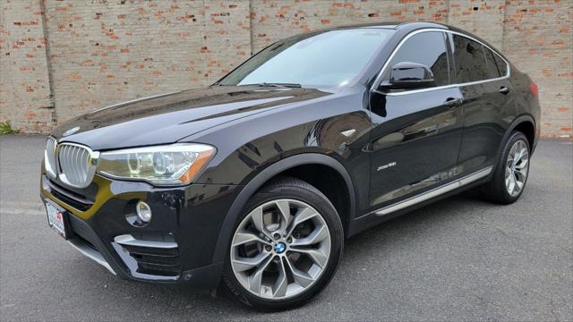 used 2018 BMW X4 car, priced at $19,500