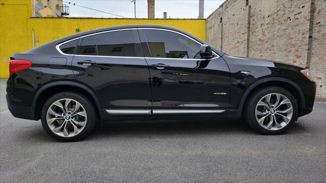 used 2018 BMW X4 car, priced at $18,500