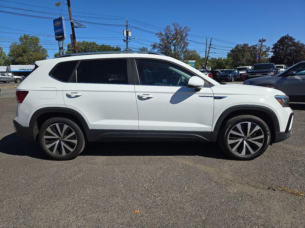 used 2023 Volkswagen Taos car, priced at $22,500
