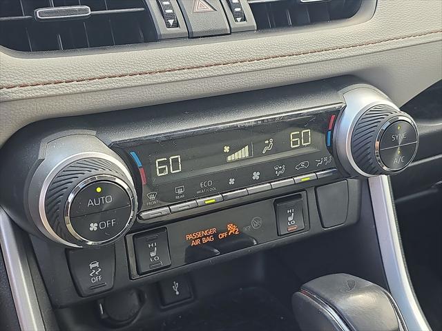 used 2022 Toyota RAV4 Hybrid car, priced at $30,000