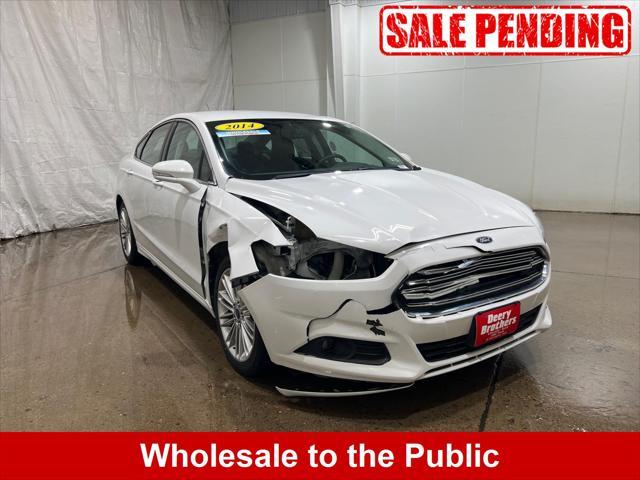 used 2014 Ford Fusion car, priced at $7,400