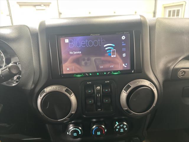 used 2013 Jeep Wrangler Unlimited car, priced at $17,806