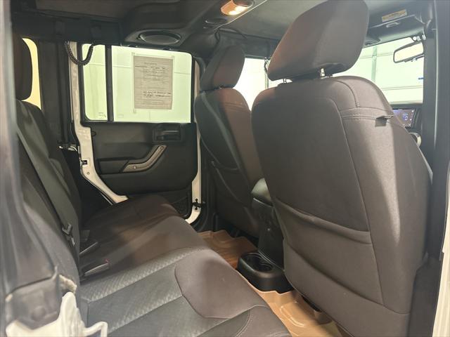 used 2013 Jeep Wrangler Unlimited car, priced at $17,806