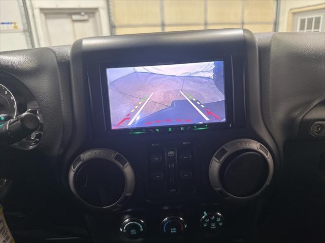 used 2013 Jeep Wrangler Unlimited car, priced at $17,806