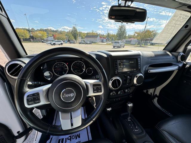 used 2015 Jeep Wrangler Unlimited car, priced at $19,769