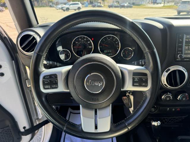 used 2015 Jeep Wrangler Unlimited car, priced at $19,769