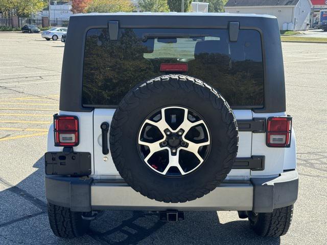used 2015 Jeep Wrangler Unlimited car, priced at $19,769