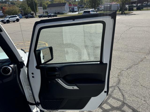 used 2015 Jeep Wrangler Unlimited car, priced at $19,769