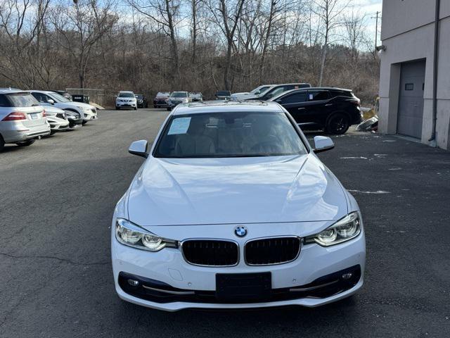 used 2018 BMW 330 car, priced at $15,020