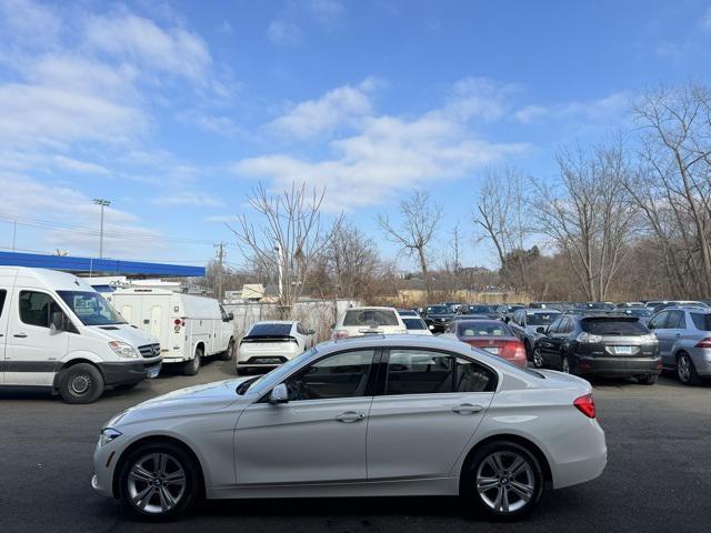 used 2018 BMW 330 car, priced at $15,020