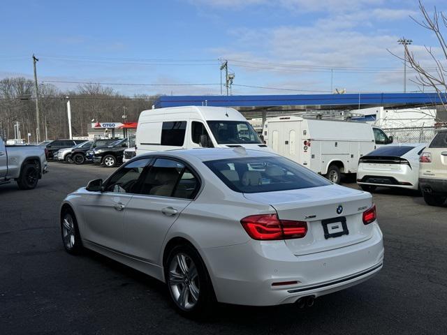 used 2018 BMW 330 car, priced at $15,020