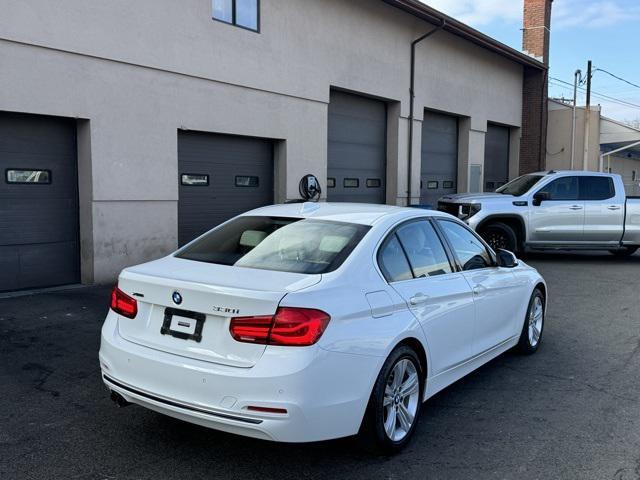 used 2018 BMW 330 car, priced at $15,020