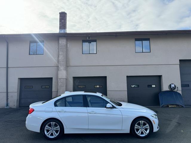 used 2018 BMW 330 car, priced at $15,020