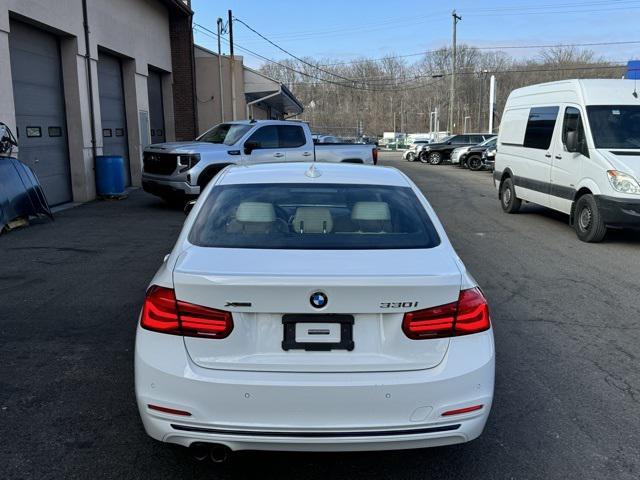 used 2018 BMW 330 car, priced at $15,020