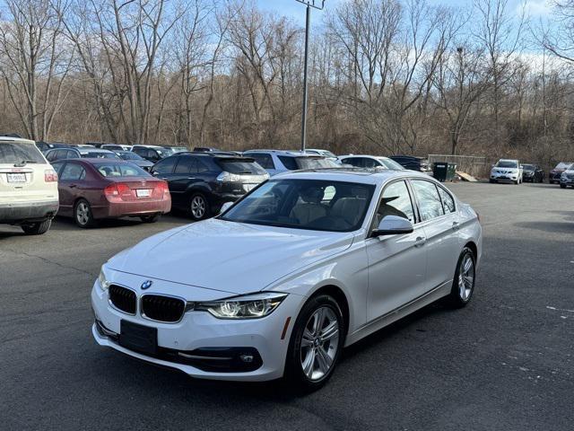 used 2018 BMW 330 car, priced at $15,020