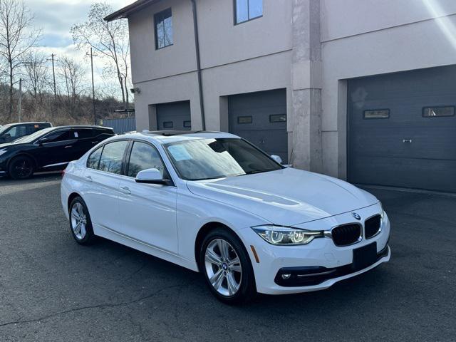 used 2018 BMW 330 car, priced at $15,020