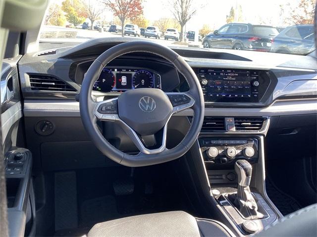 used 2023 Volkswagen Taos car, priced at $27,595