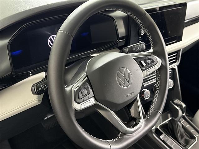 new 2025 Volkswagen Taos car, priced at $28,504