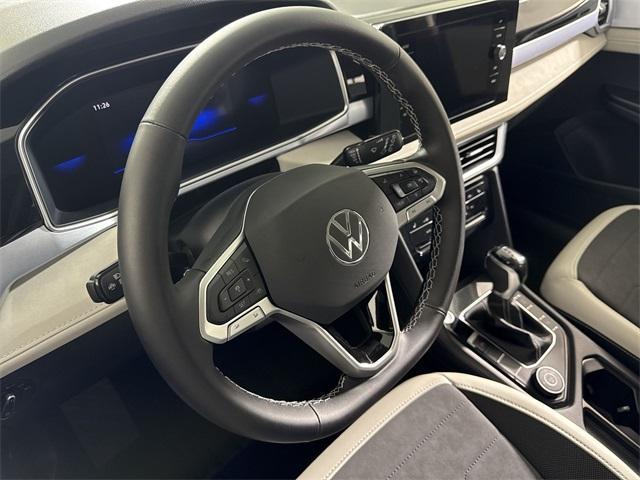 new 2025 Volkswagen Taos car, priced at $28,697