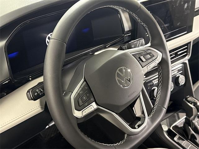 new 2025 Volkswagen Taos car, priced at $27,989