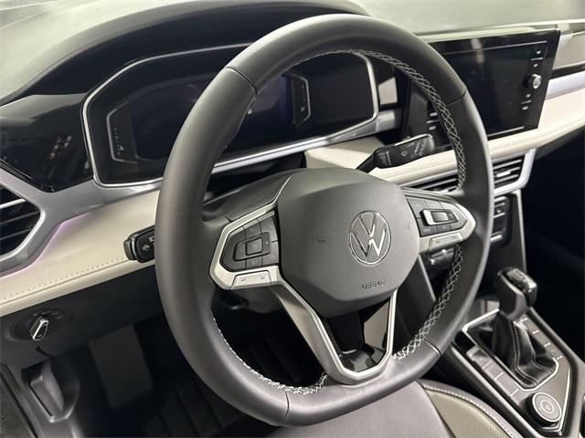 new 2025 Volkswagen Taos car, priced at $34,444