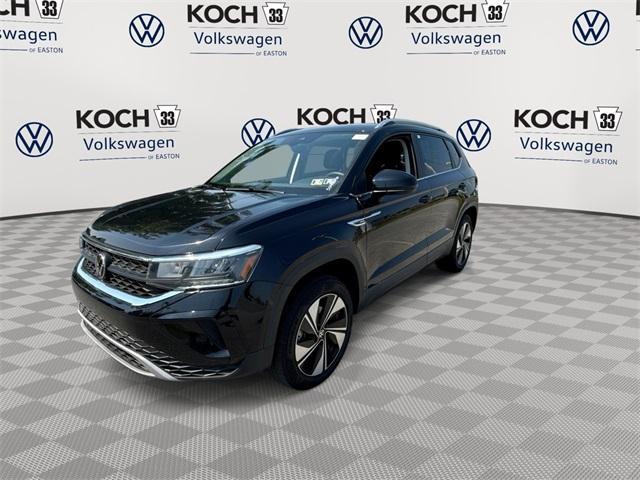 used 2024 Volkswagen Taos car, priced at $25,461
