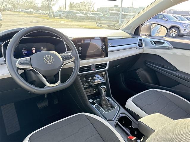 new 2025 Volkswagen Taos car, priced at $27,411
