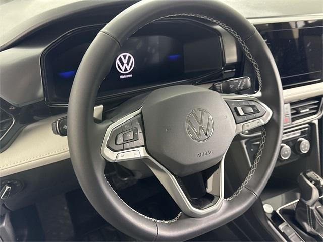 new 2025 Volkswagen Taos car, priced at $27,989