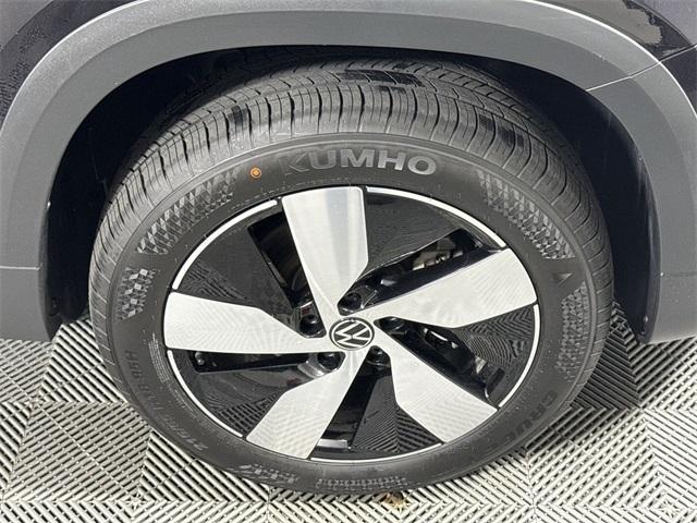 used 2024 Volkswagen Taos car, priced at $22,393