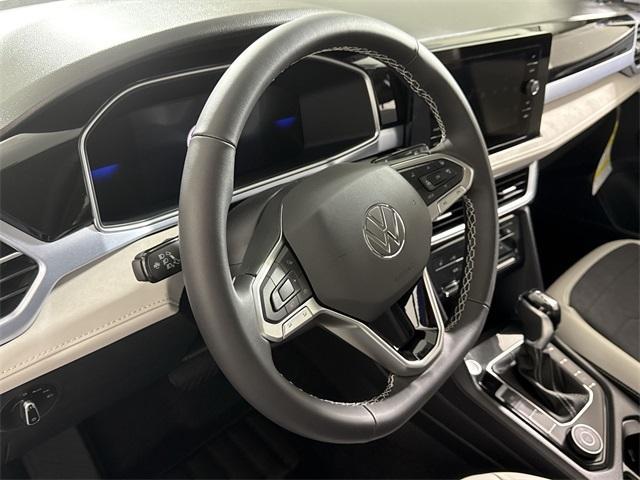 new 2025 Volkswagen Taos car, priced at $28,697