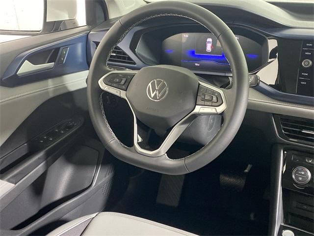 new 2024 Volkswagen Taos car, priced at $29,153