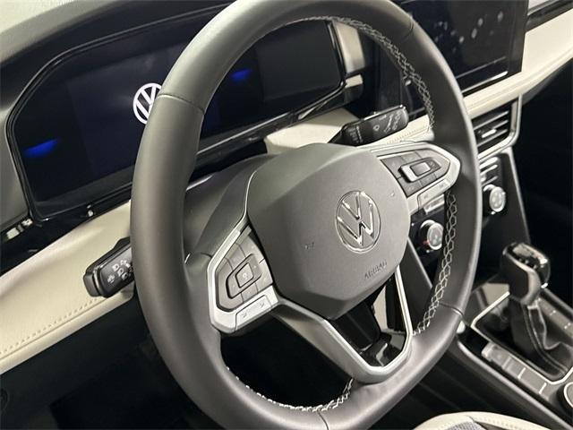 new 2025 Volkswagen Taos car, priced at $27,390