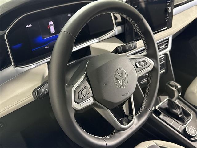 new 2025 Volkswagen Taos car, priced at $30,796