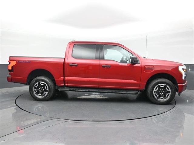 used 2023 Ford F-150 Lightning car, priced at $34,999