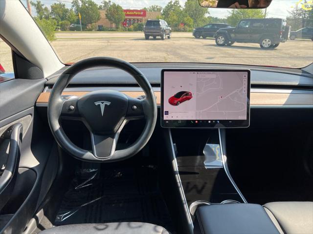 used 2018 Tesla Model 3 car, priced at $25,000