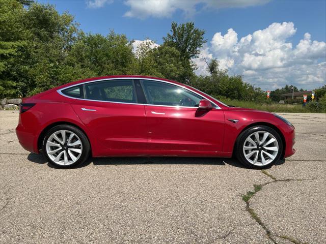 used 2018 Tesla Model 3 car, priced at $25,000