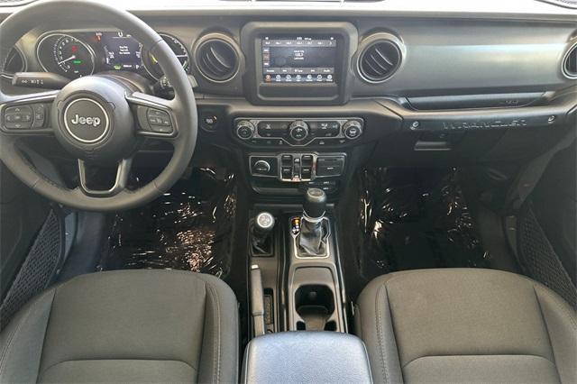 used 2023 Jeep Wrangler 4xe car, priced at $29,702