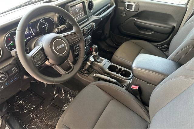used 2023 Jeep Wrangler 4xe car, priced at $29,702