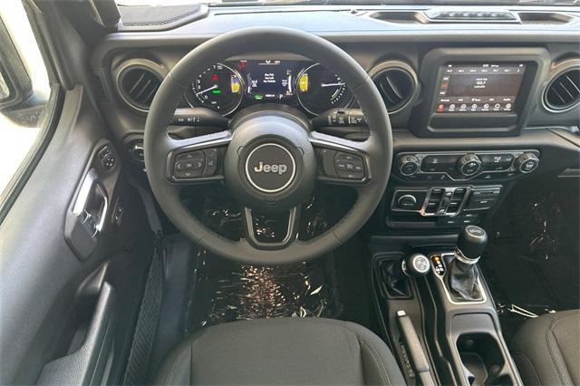 used 2023 Jeep Wrangler 4xe car, priced at $29,702