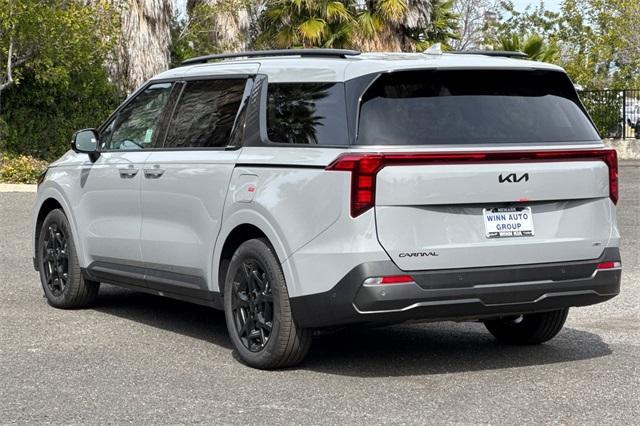 new 2025 Kia Carnival Hybrid car, priced at $53,595