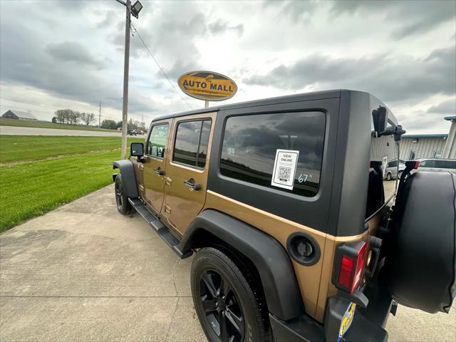 used 2015 Jeep Wrangler Unlimited car, priced at $22,990
