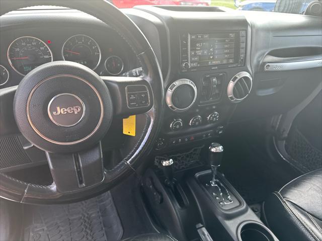 used 2014 Jeep Wrangler Unlimited car, priced at $22,990