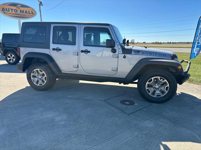 used 2014 Jeep Wrangler Unlimited car, priced at $20,990